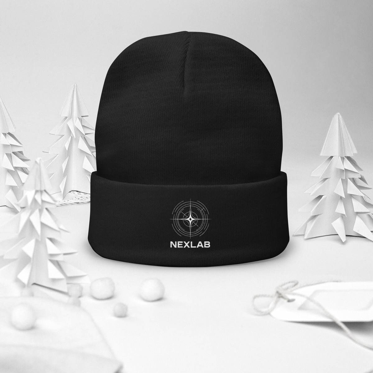 Navigation Beanie in Black — front view in white holiday setting