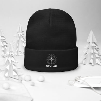 Navigation Beanie in Black — front view in white holiday setting